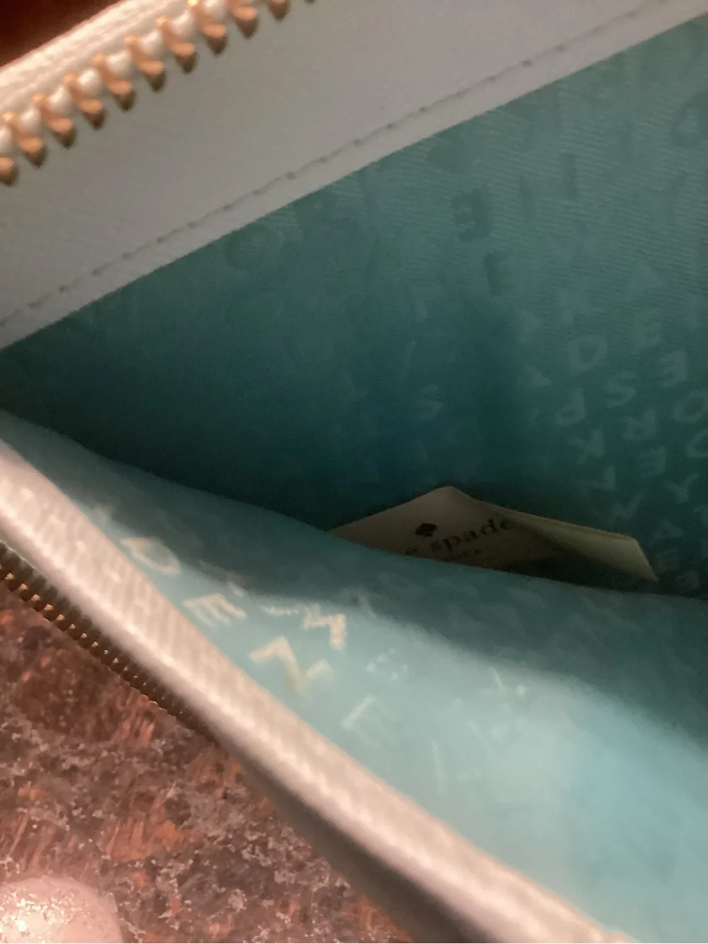 kate spade pale blue small flap wallet with gold plaque